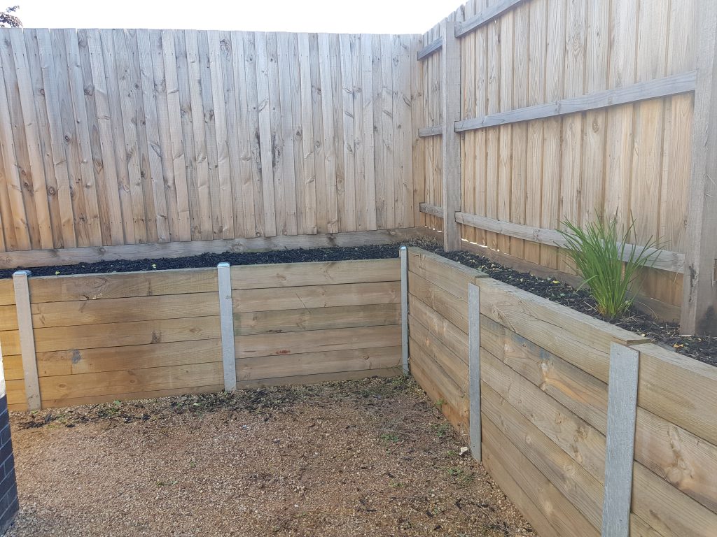Fence and Raised Flower Beds